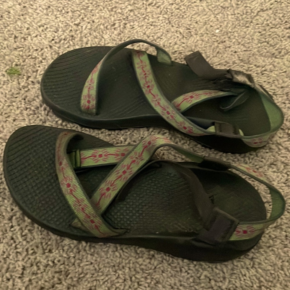 Chaco Sandals green straps with red suns.